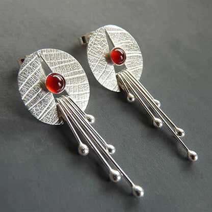Boucles d'oreilles en pierre rouge exclusive