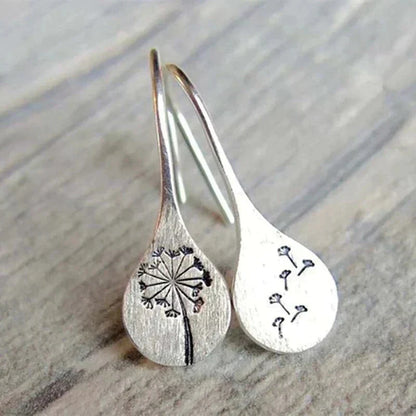 Boucles d'oreilles vintage en argent avec fleurs