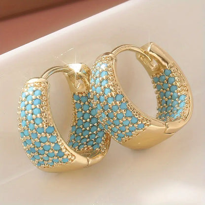 Boucles d'oreilles créoles en turquoise et ton doré